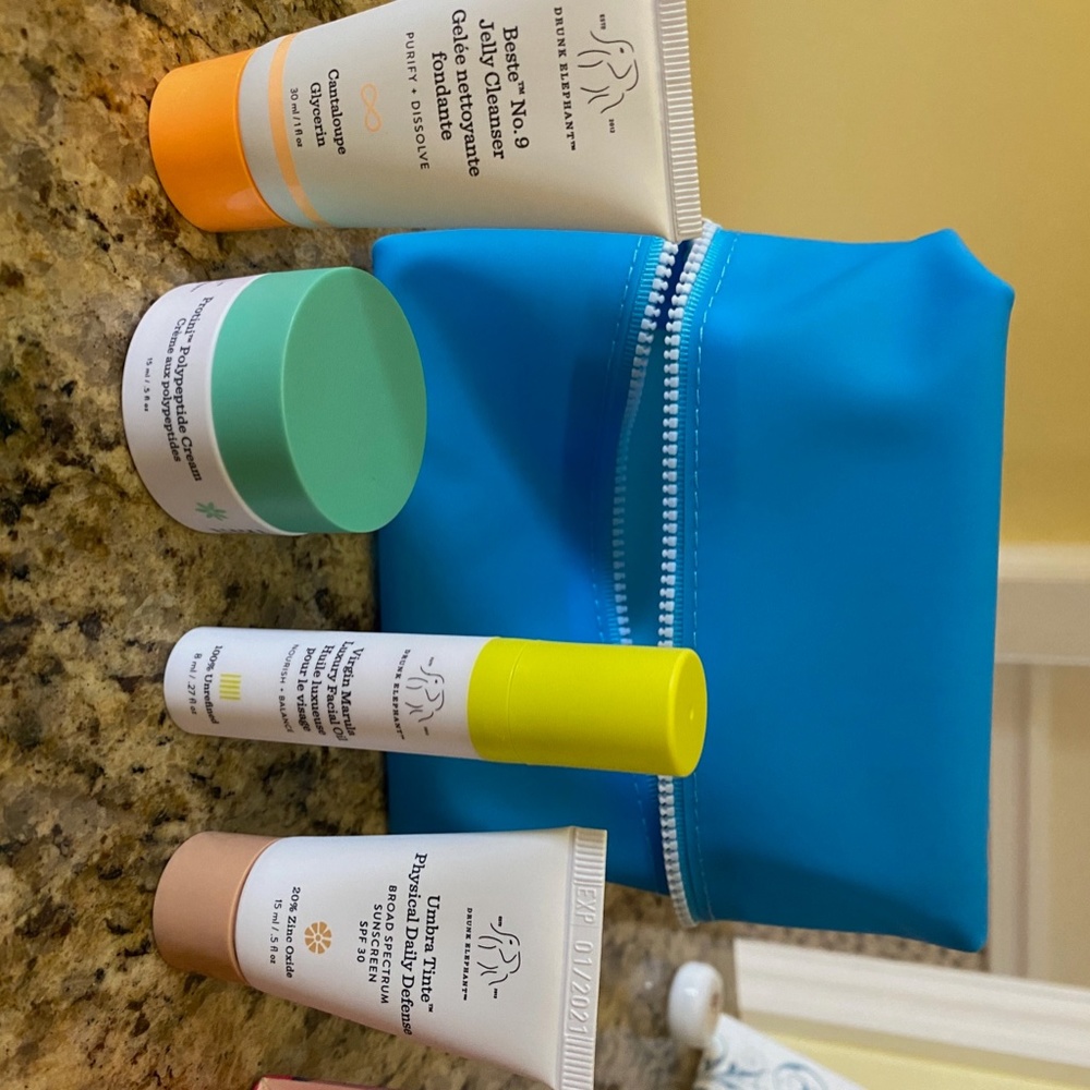 Drunk Elephant set for 4 littles plus bag